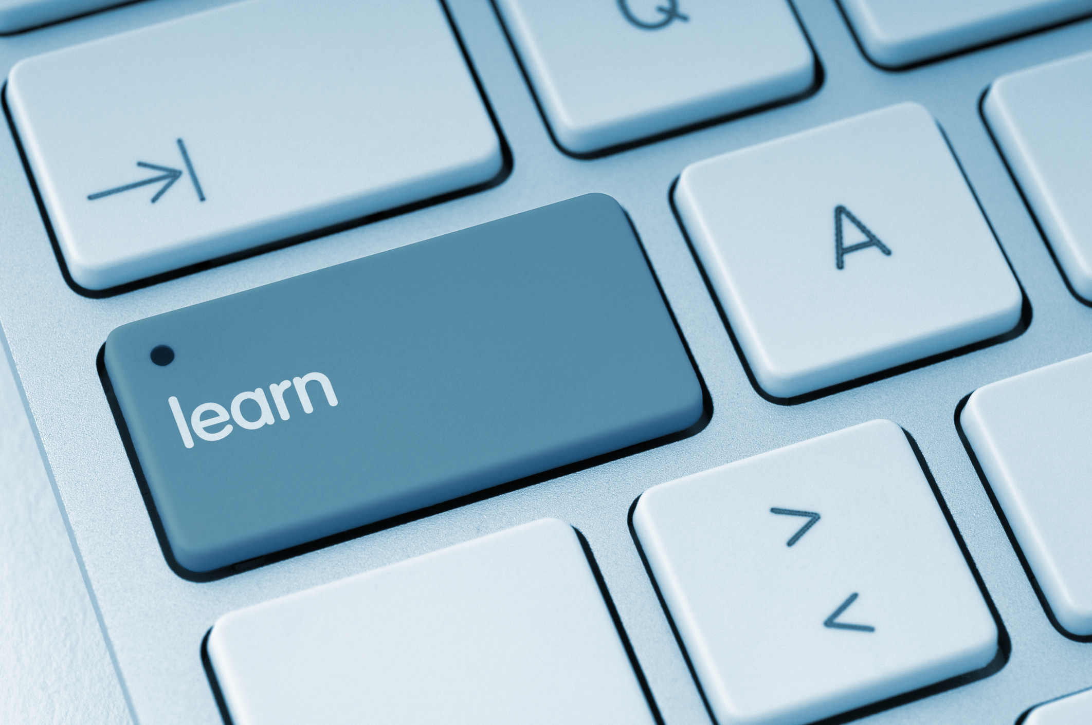 Computer Keyboard with symbolic "learn" key